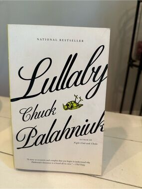 Lullaby by Chuck Palahniuk - White Paperback Book
